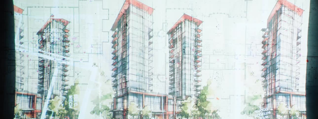 Drawings of buildings appear on top of paper blueprints