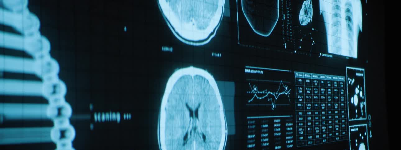 Medical imaging of a dna strand and body parts are projected on the wall