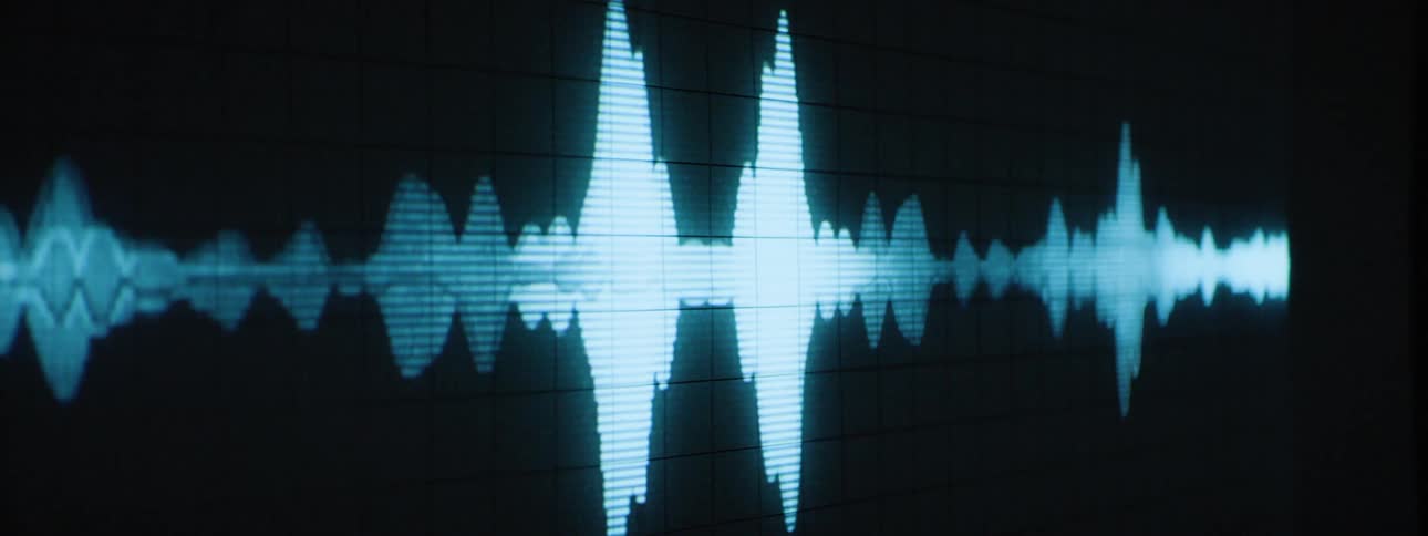 A volume bar is projected on the wall and is jumping up and down