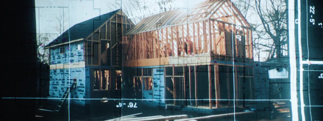 Images of houses a projected onto a wall