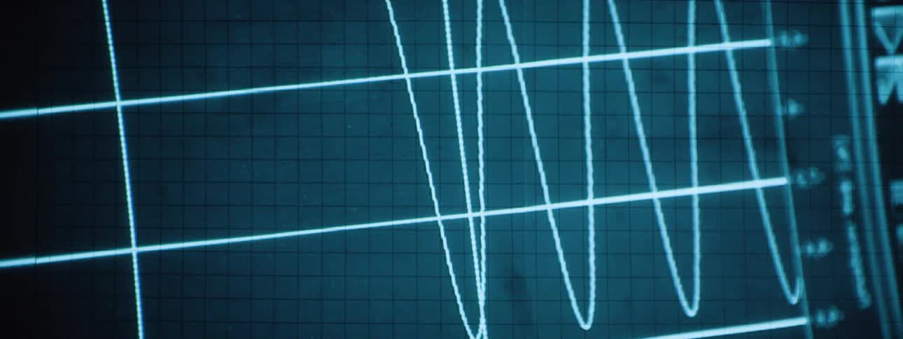 A heart rate monitor displaying readings with lines moving up and down in a zigzag pattern