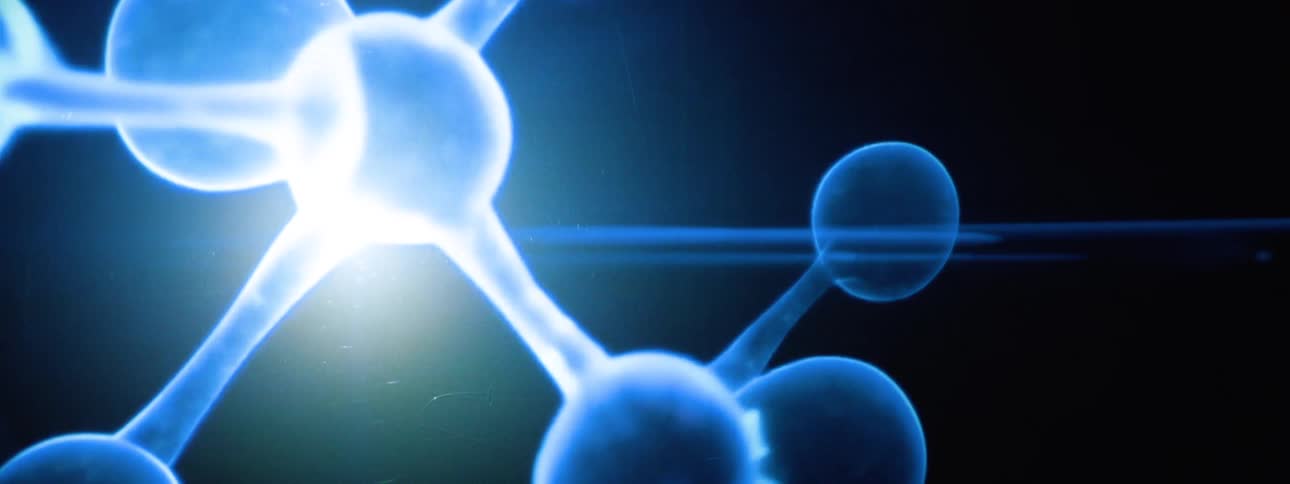 The animation is a microscopic look at glowing floating cells