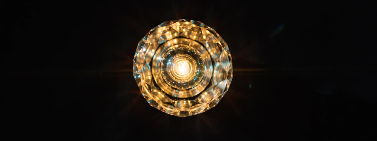 A circular object glistens off the light