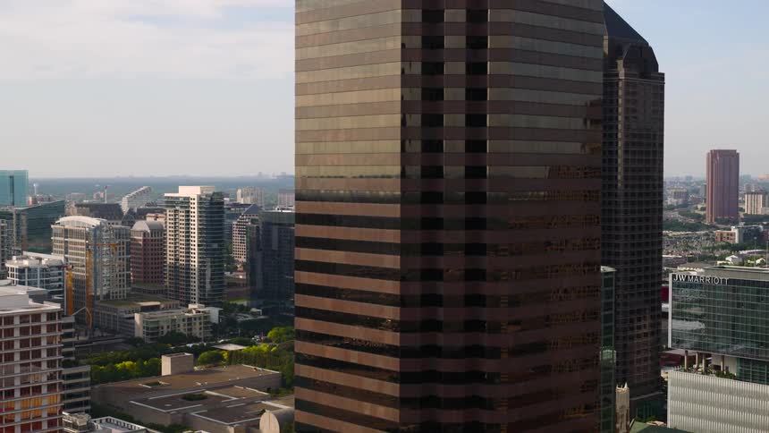 Aerial view of modern city skyscrapers in a dense metropolitan area