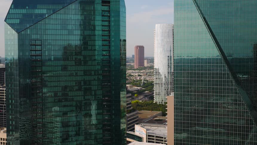 Aerial view of a cluster of modern skyscrapers in a cityscape