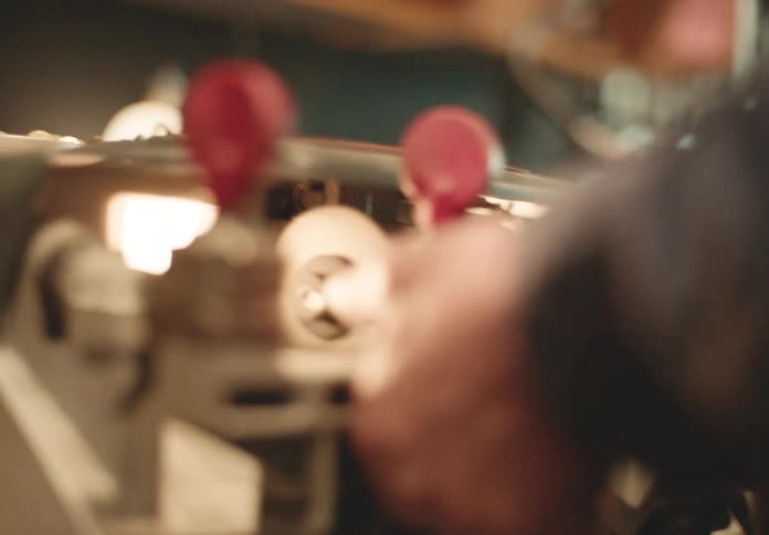 A man is working on a machine in the factory