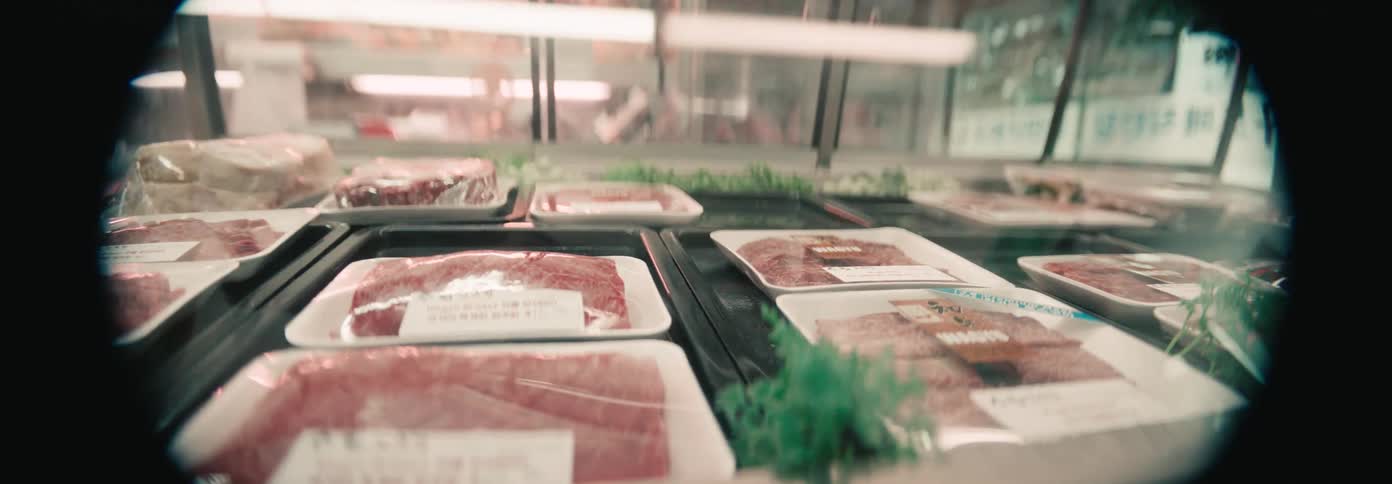 Cuts of meat are behind the glass