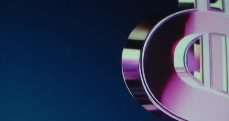 Digitally animated dollar sign rotates against a blue background