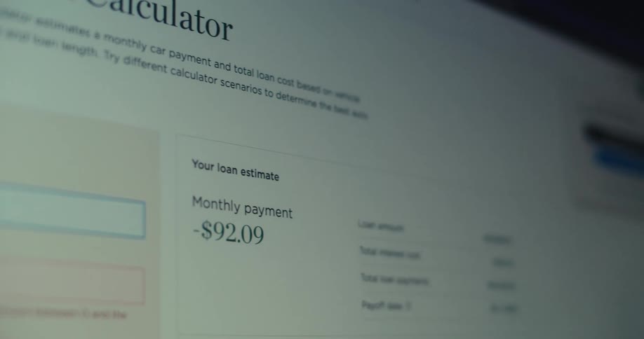 A car loan calculator interface is shown on a screen