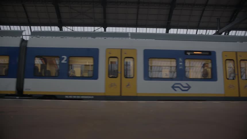 A subway train drives by