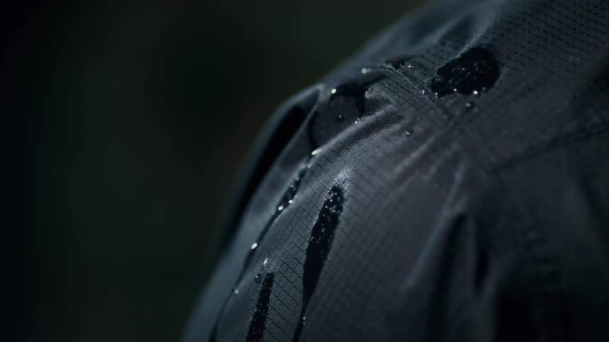 Rain drops fall onto clothing