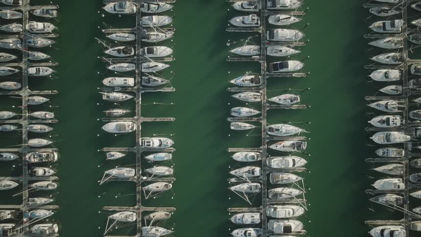 The pier is full of docked boats