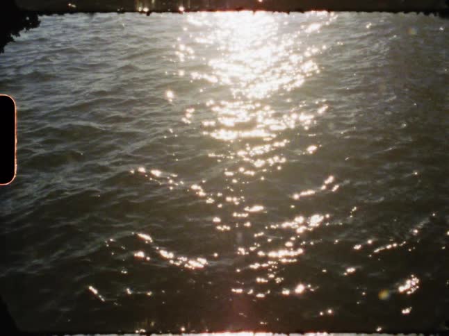 Calm ocean waters and the reflection of the sun