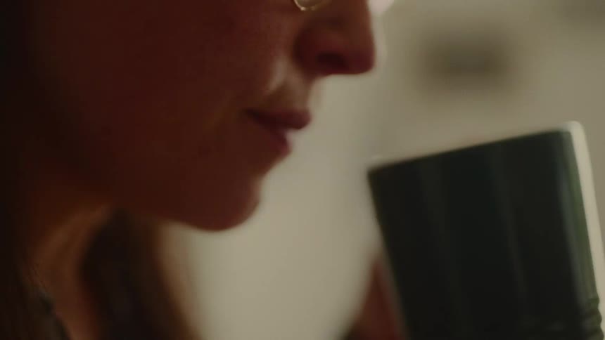 Woman drinking from a mug