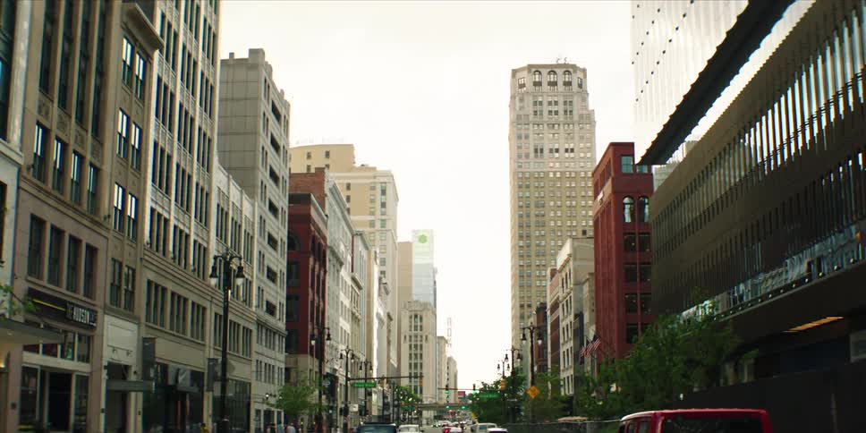 Traffic flows down the city street