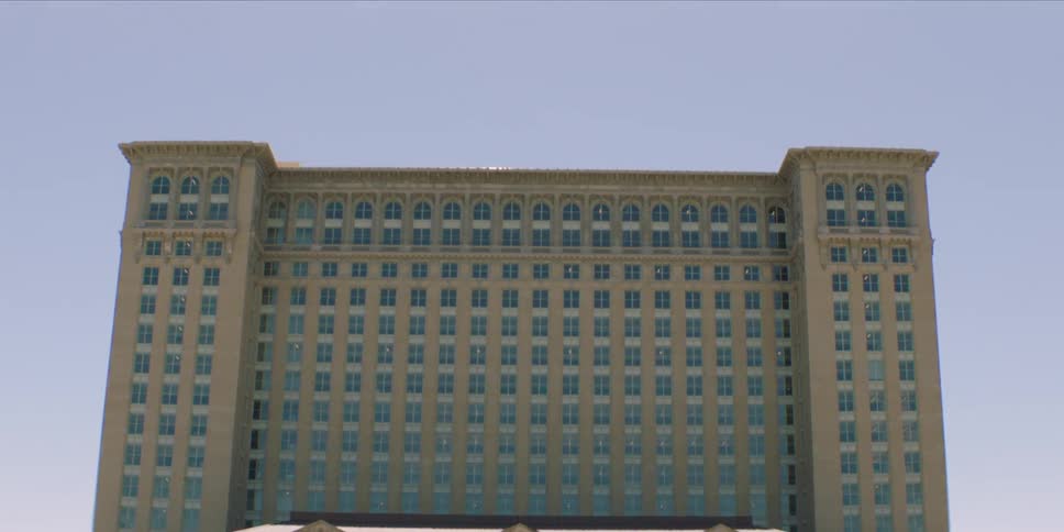The tall building has many windows