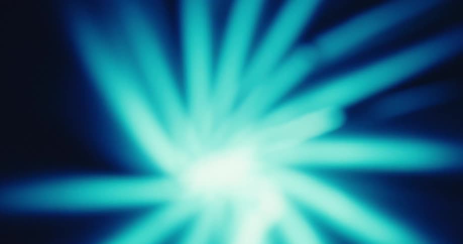 Soft blurry rays of blue and white light emanate from a central point creating an energetic and futuristic abstract visual