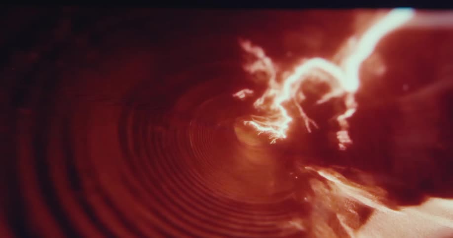 Streak of lightning flows down a tunnel of rings