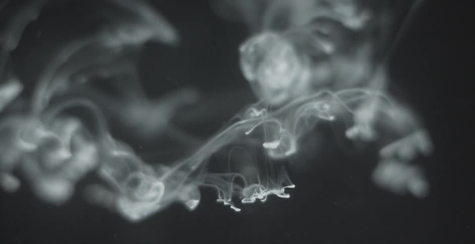 White liquid falls slowly