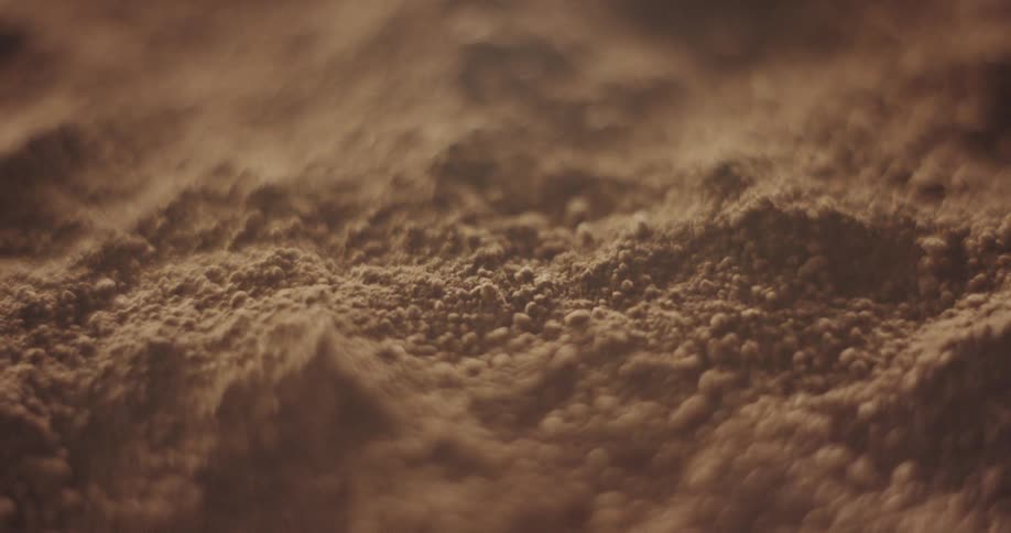 Light is on the ground filled with dirt