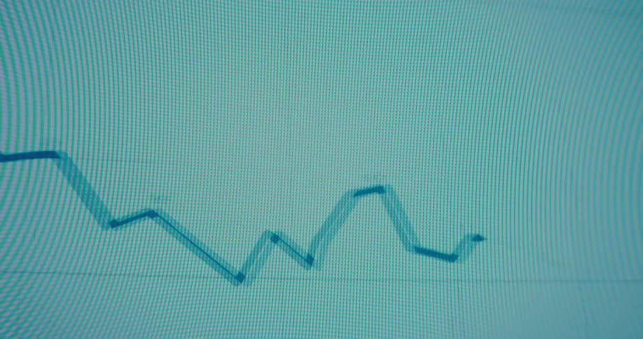 A line on a graph moves up and down as it travels across a screen