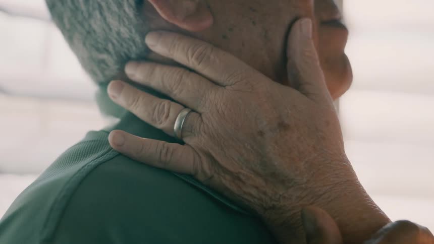 Elderly couple in an affectionate moment