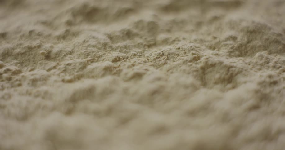 A fine dirt is covering a surface