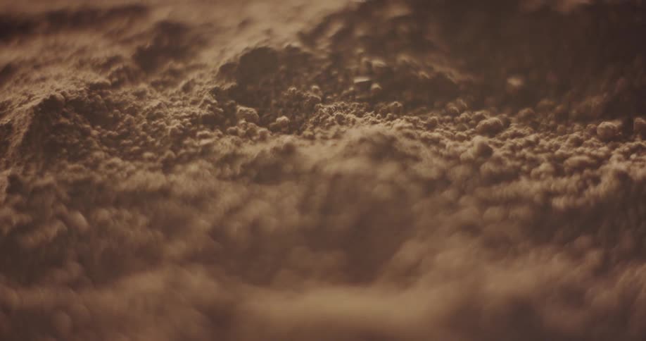 Hills form in a brown powder