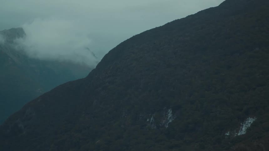 Heavy fog is moving over the mountains