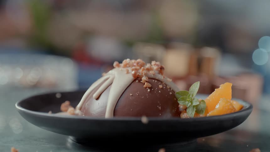 Nut topping is spread onto a dessert dish