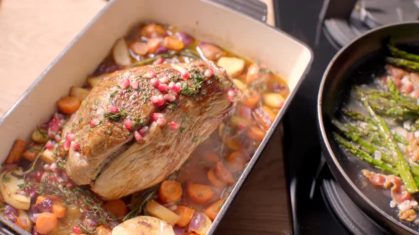 Someone prepares a meal on the stove