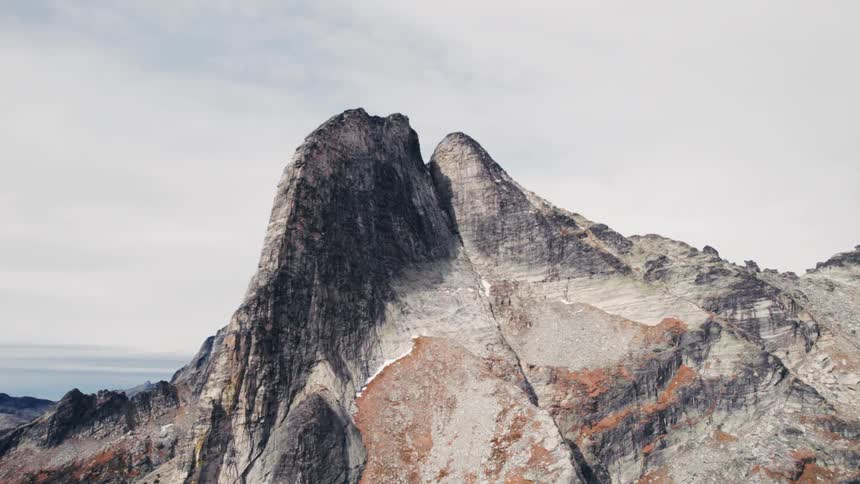 The tall mountain touches the clouds