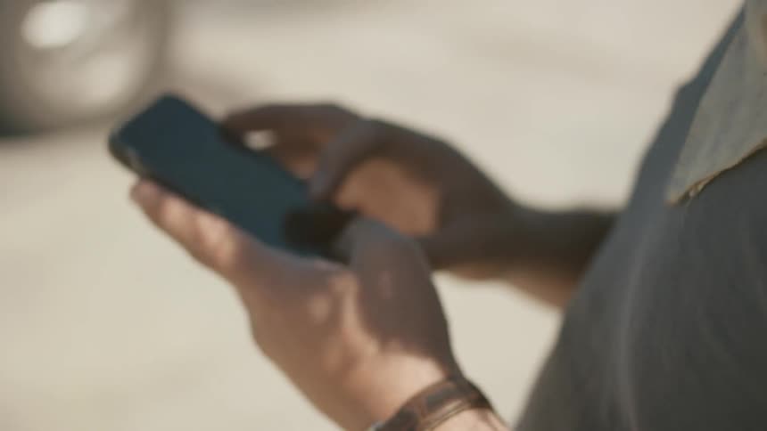 A person uses their phone