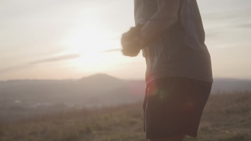 Man jumping rope outdoors