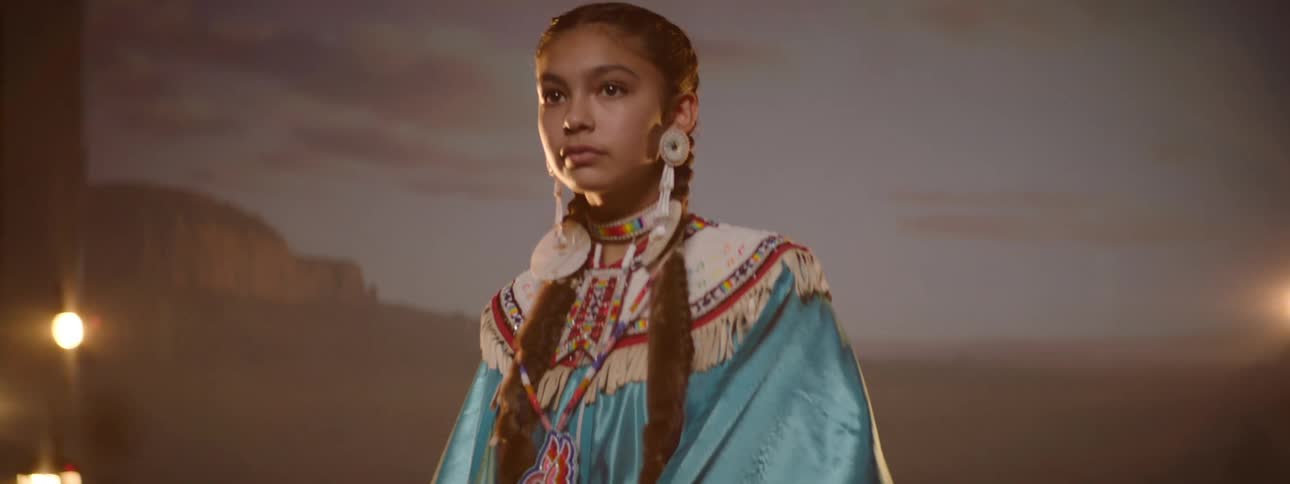 A young native american woman in a photo studio