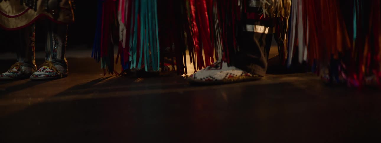 People in costumes are on the stage