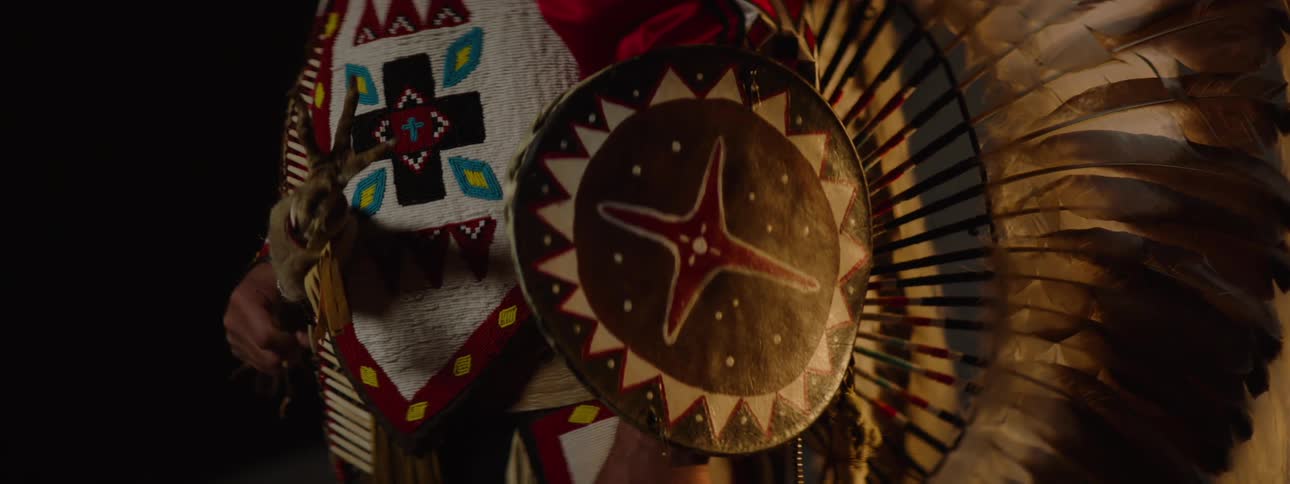 Man wearing traditional indigenous costume