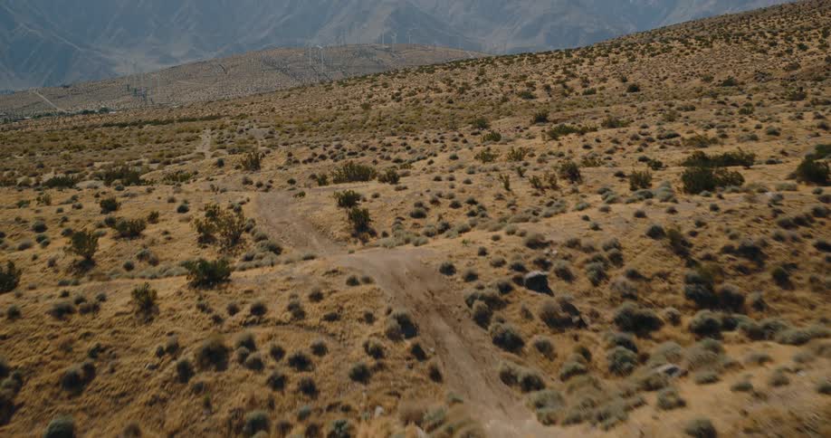The landscape leads to the mountains