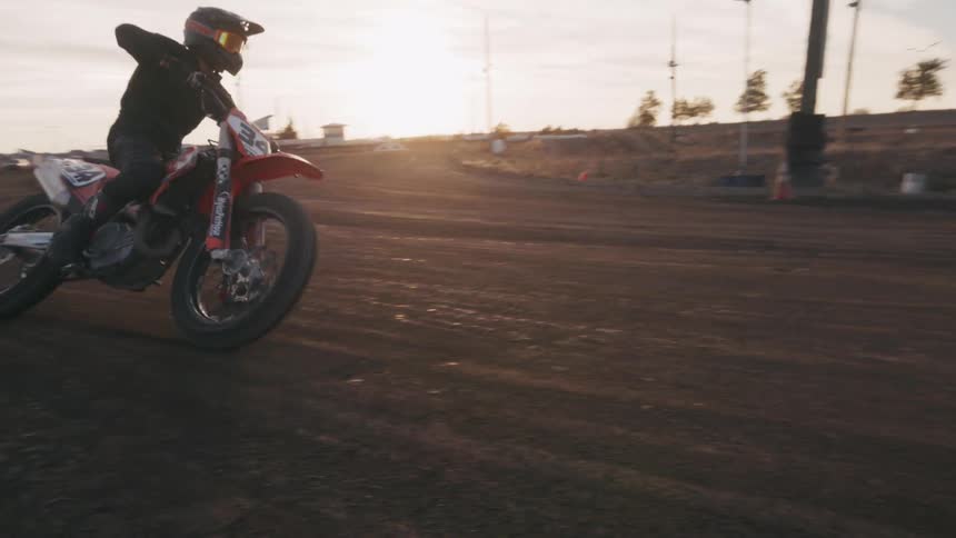 A man riding a motorcycle in a rally race
