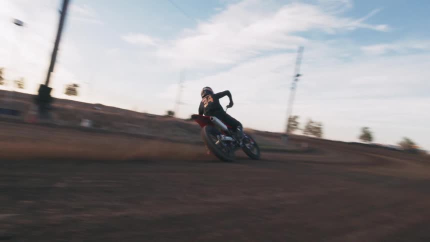 Person practicing motocross on a dirt area