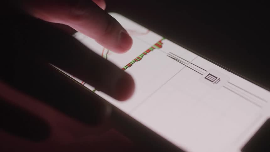A person is scrolling on their phone