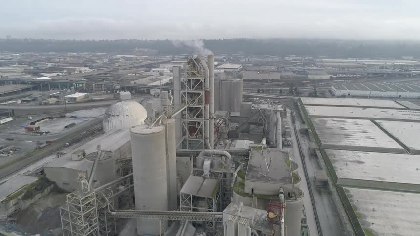 Smoke rises out of the power plant