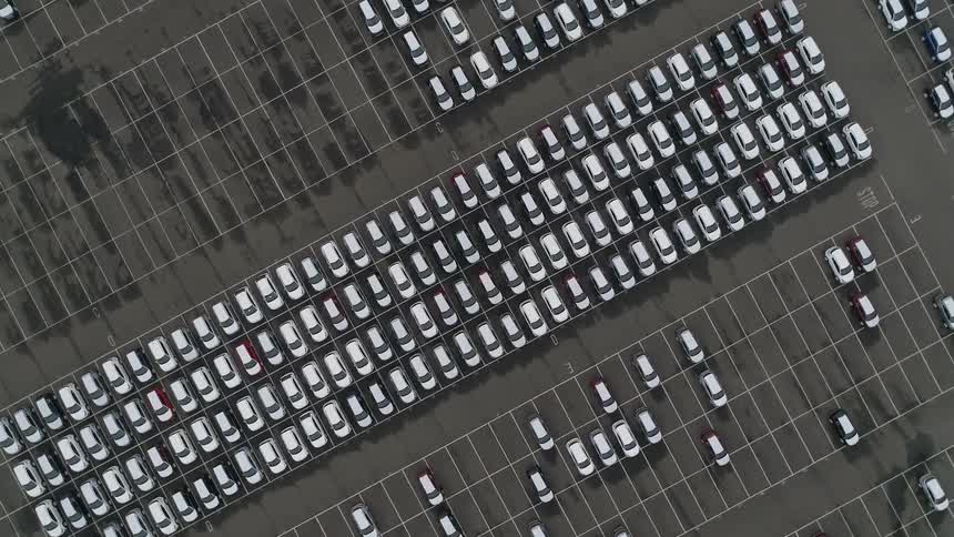 A parking lot with many cars