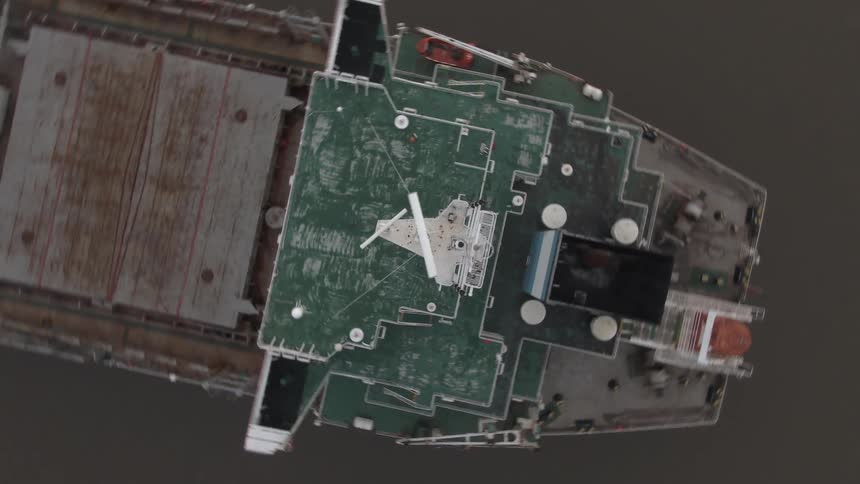 Aerial view of a ship with a moving antenna