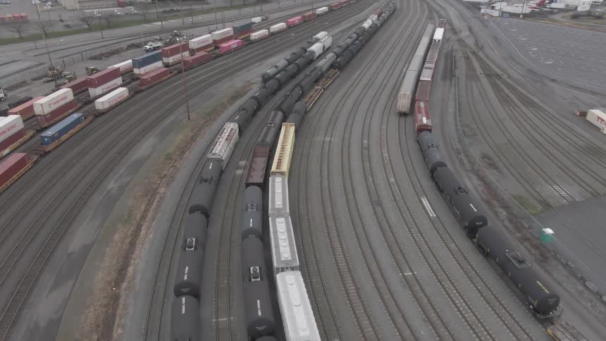 Aerial view of containers on train cars