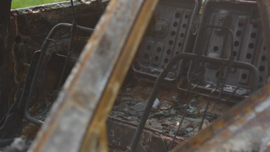 The charred remains of a steel frame