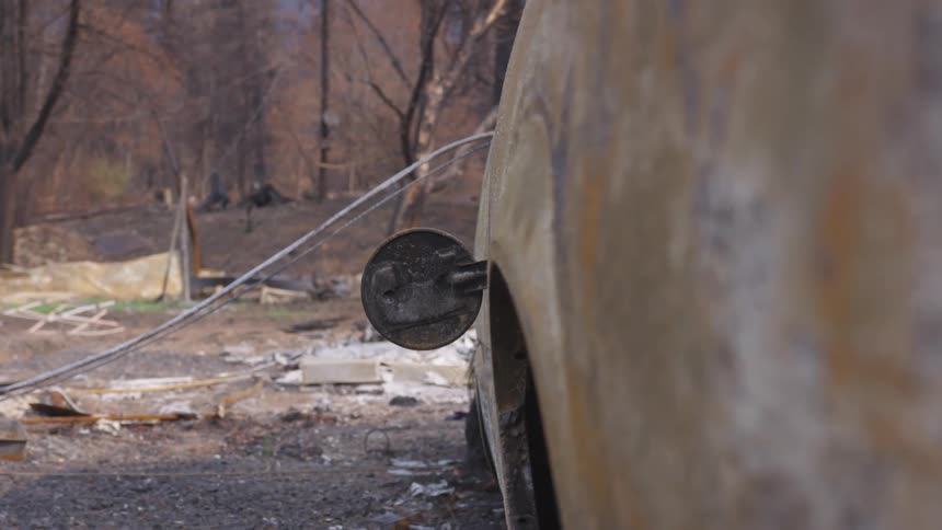 The area is burned and full of ash and debris