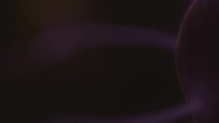 Abstract moving purple magnetic lines waves