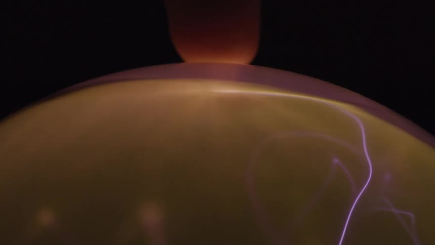 As a finger slowly inches toward the plasma globe wild electric beams begin to converge and intensify locking onto the point of contact with a bright focused arc