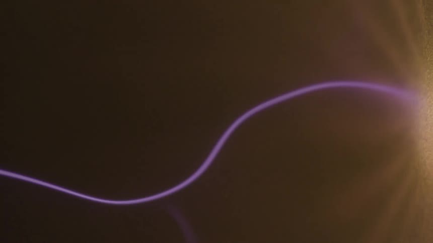 Close up of violet colored magnetic wave lines